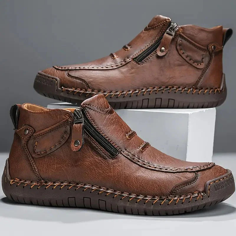 Men's ankle boots in brown with side zip closure and lugged sole detail