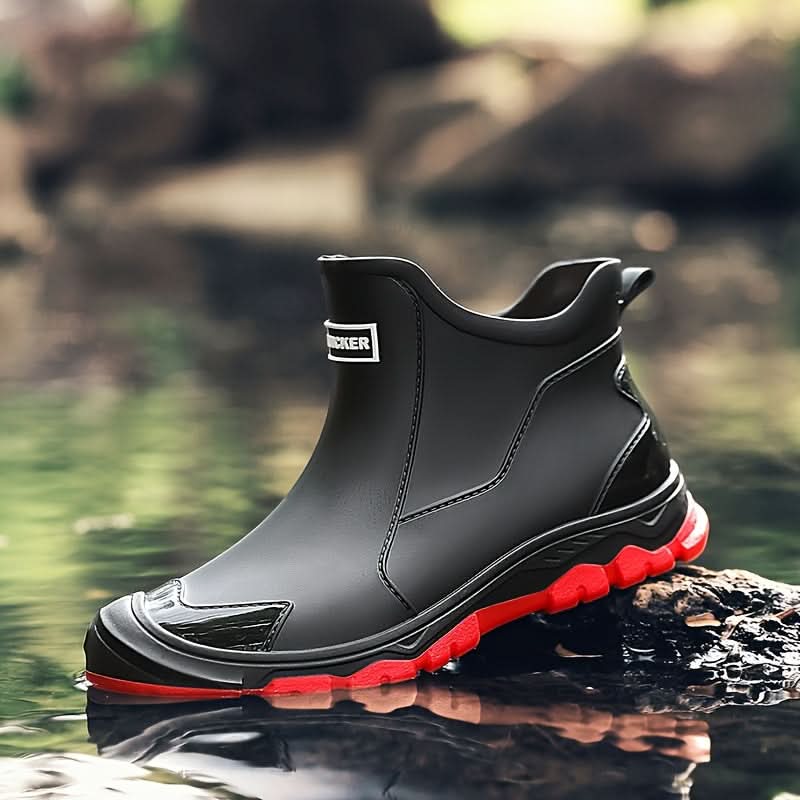 Close-up of men's Chelsea boots showing elasticated gusset and pull tab detail
