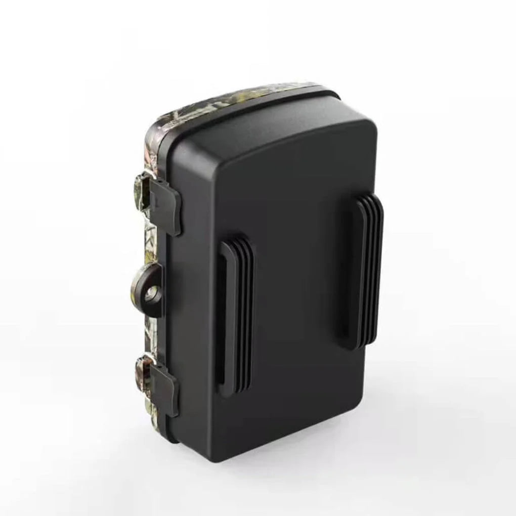 Weatherproof wildlife camera with mounting strap on outdoor post