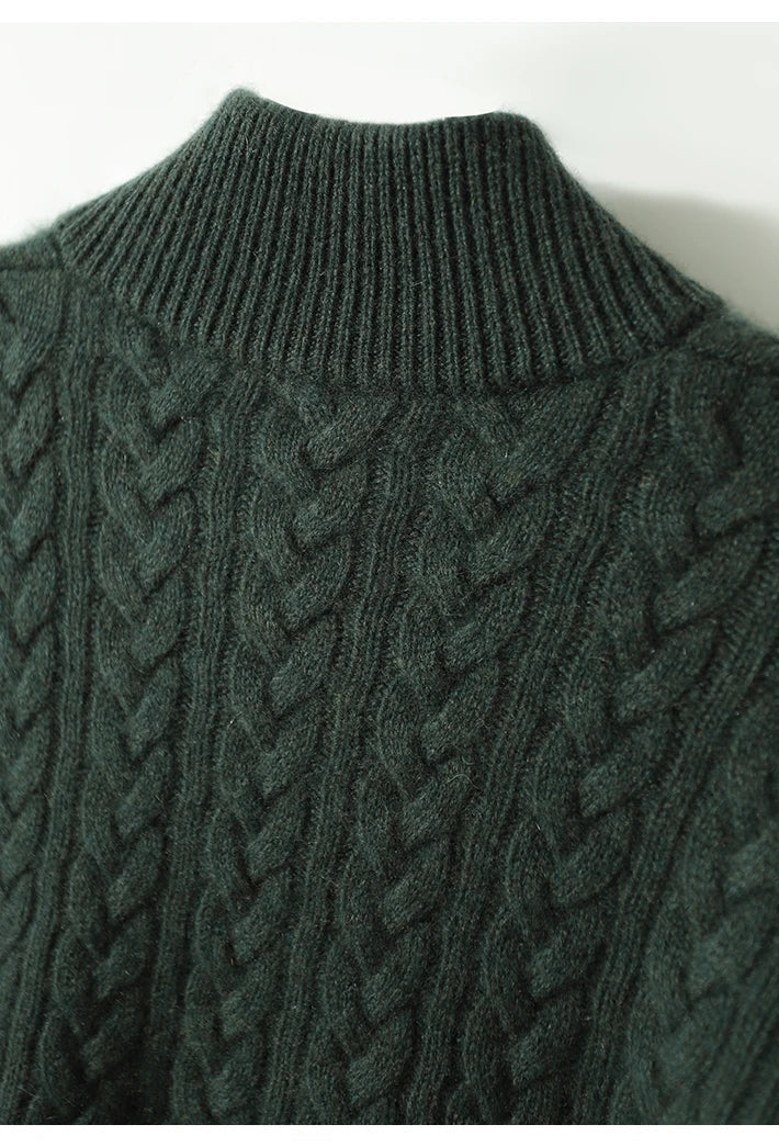 Close-up of soft cable-knit texture on vintage beige cashmere cardigan