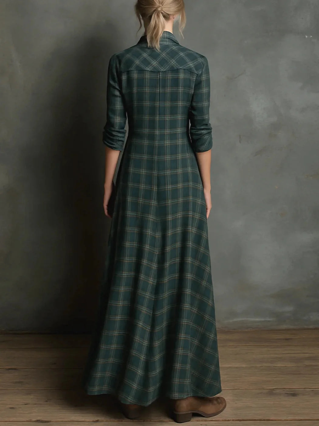 Checked maxi shirt dress showing relaxed fit and flowing length with chest pocket detail
