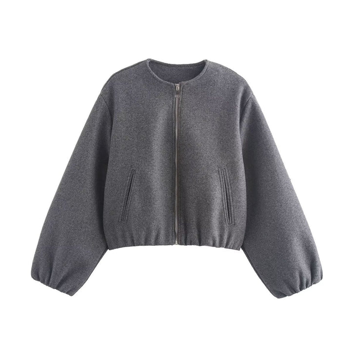 Women's cropped bomber jacket in grey with elasticated hem, cuffs and voluminous sleeves on white background