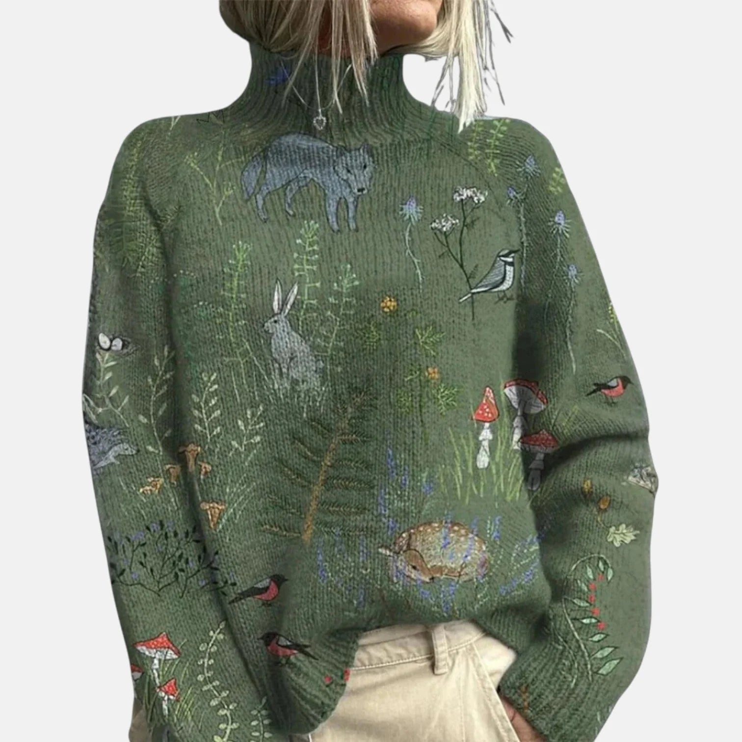Women's embroidered turtleneck jumper in sage green with woodland animal and botanical motifs across ribbed knit fabric