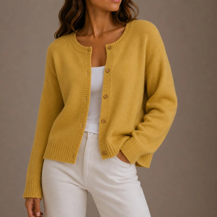 Women's button-up cardigan styled open over casual basics for layered everyday look