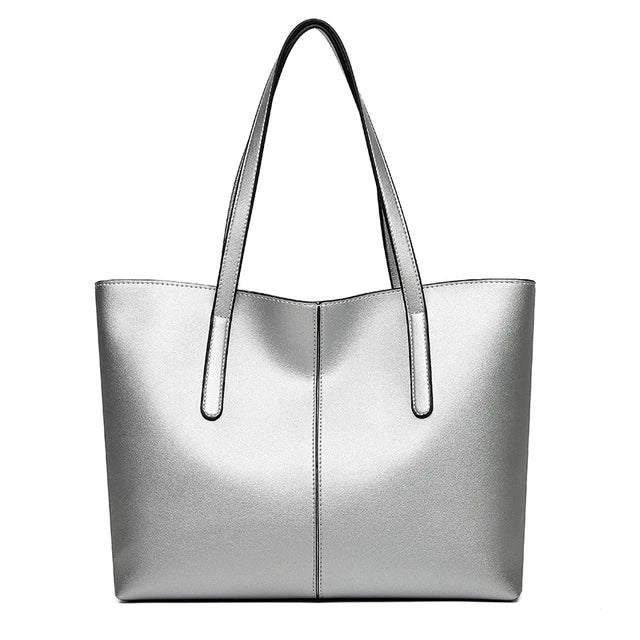 Black structured tote bag displayed flat showing roomy silhouette and clean lines