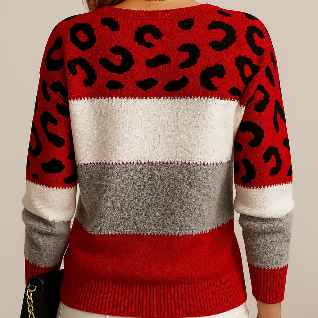 Ribbed cuff detail on leopard print colour block jumper showing soft knit construction