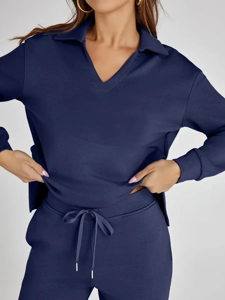 Side profile of taupe lounge set with V-neck top and wide leg trousers