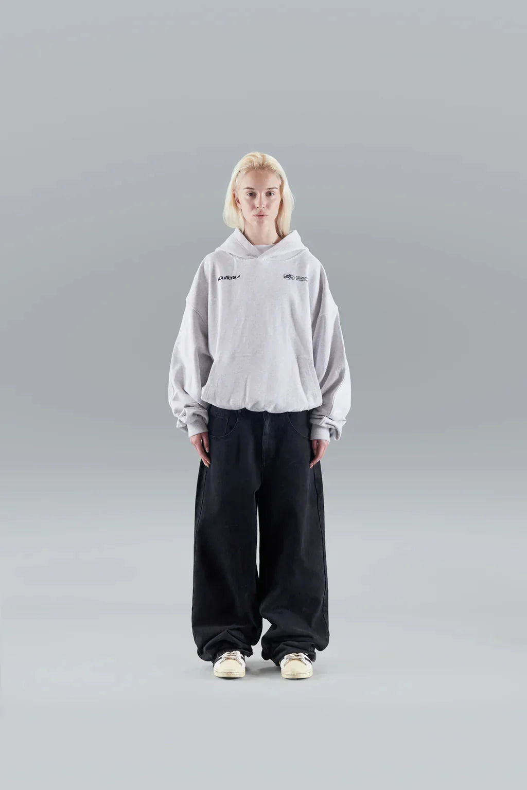 Women's cropped hoodie showing length just above waist when worn