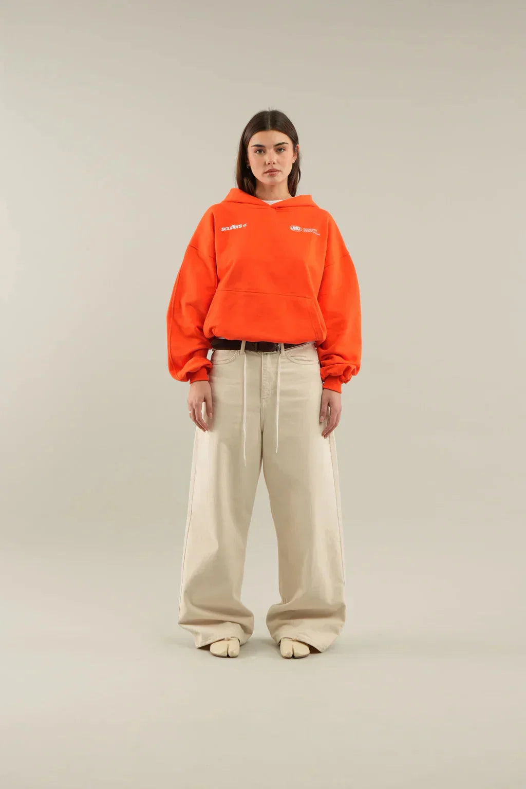 Detail of ribbed cuffs and hem on women's oversized hoodie