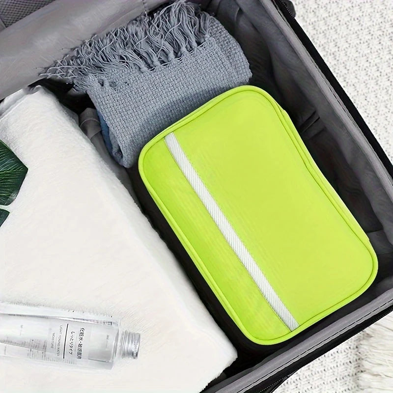 Men's hanging toiletry organiser with multiple pockets and compartments for grooming essentials and travel items