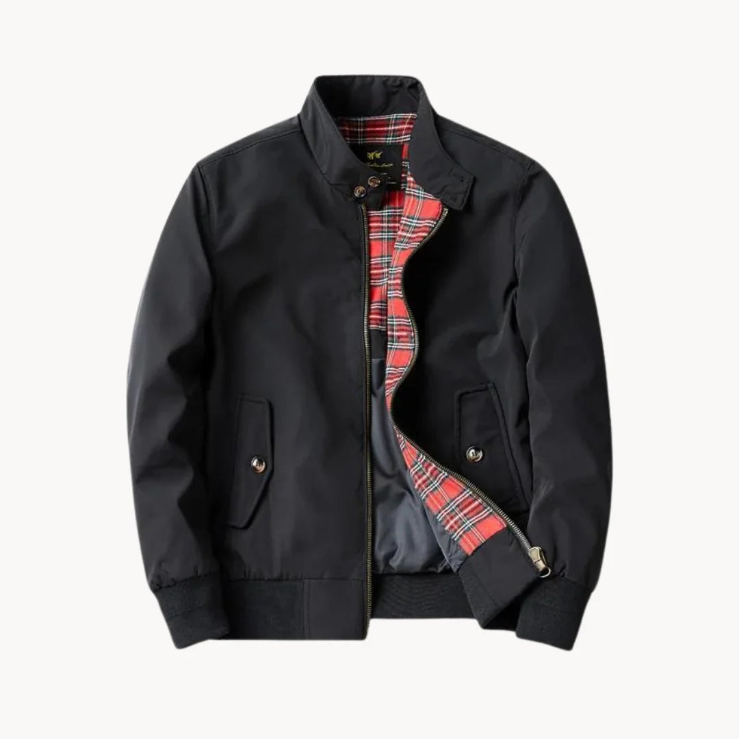 Men's navy Harrington jacket styled open to reveal tartan lining and classic bomber fit