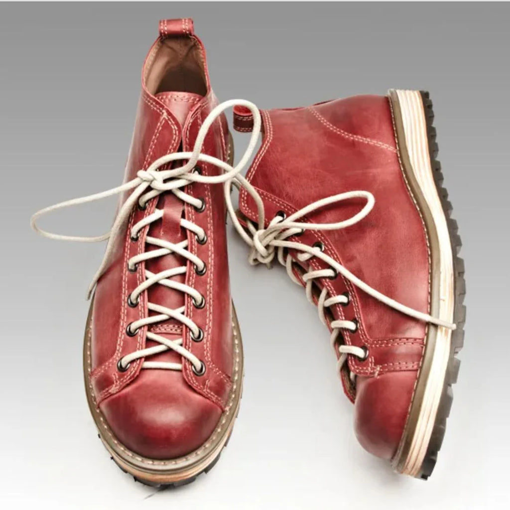 Heel pull tab detail on men's hiking boots for easy entry and removal
