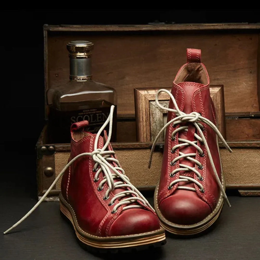 Men's lace-up hiking boots in dark green colourway with structured upper construction
