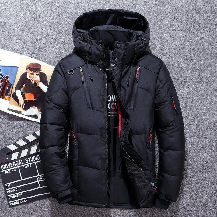 Side angle of men's hip-length puffer jacket with ribbed cuffs and water-resistant finish