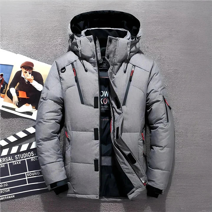 Men's padded winter jacket styled open showing black interior lining and zip pockets
