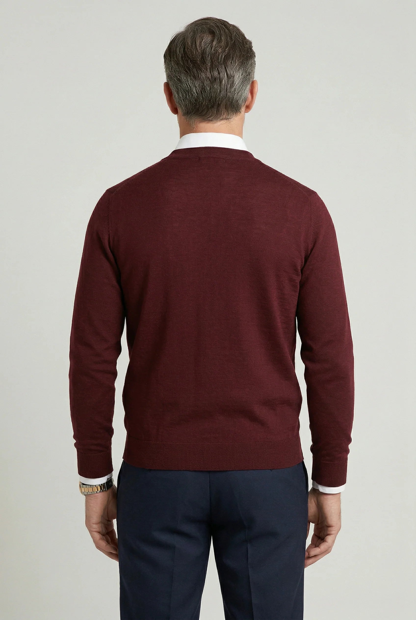 Close-up of men's cardigan showing soft knit texture and button-through detail