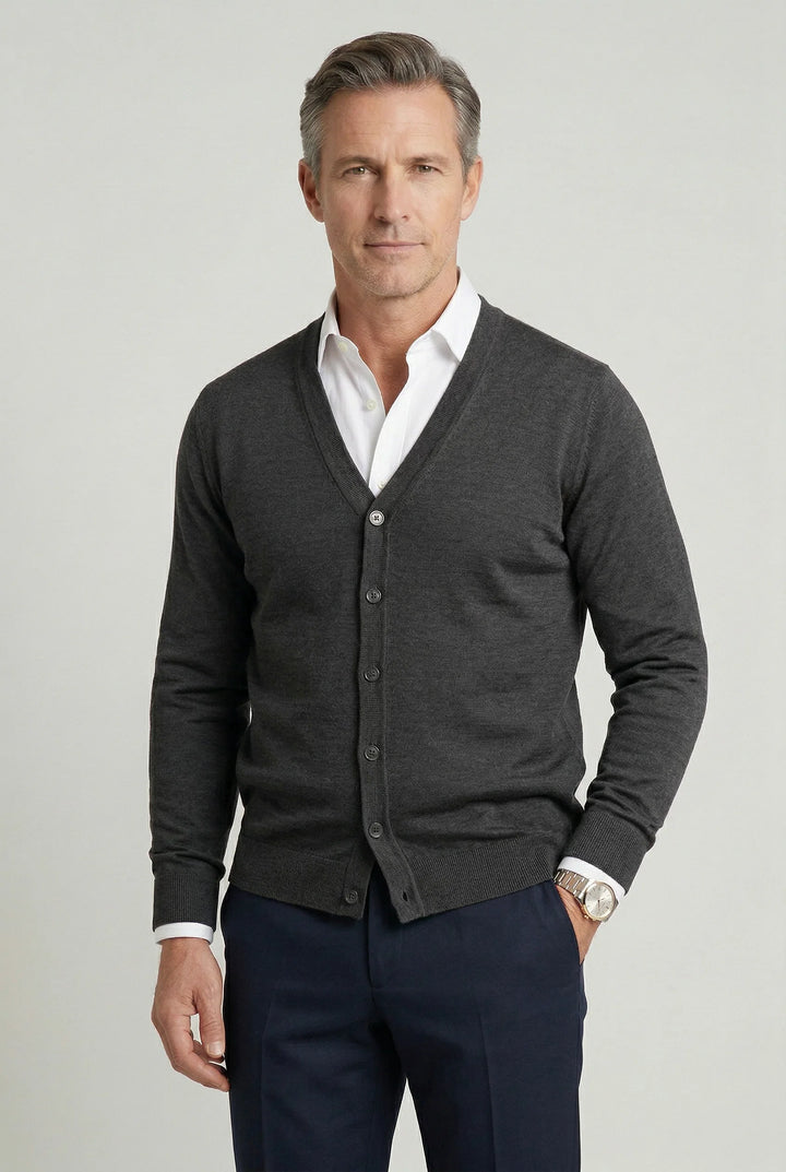 Back view of men's cardigan highlighting knit construction and hem detail