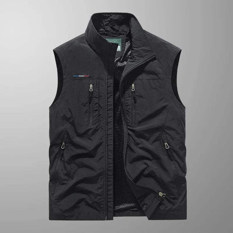 Front view of men's outdoor gilet showing six zip pockets and mesh lining detail