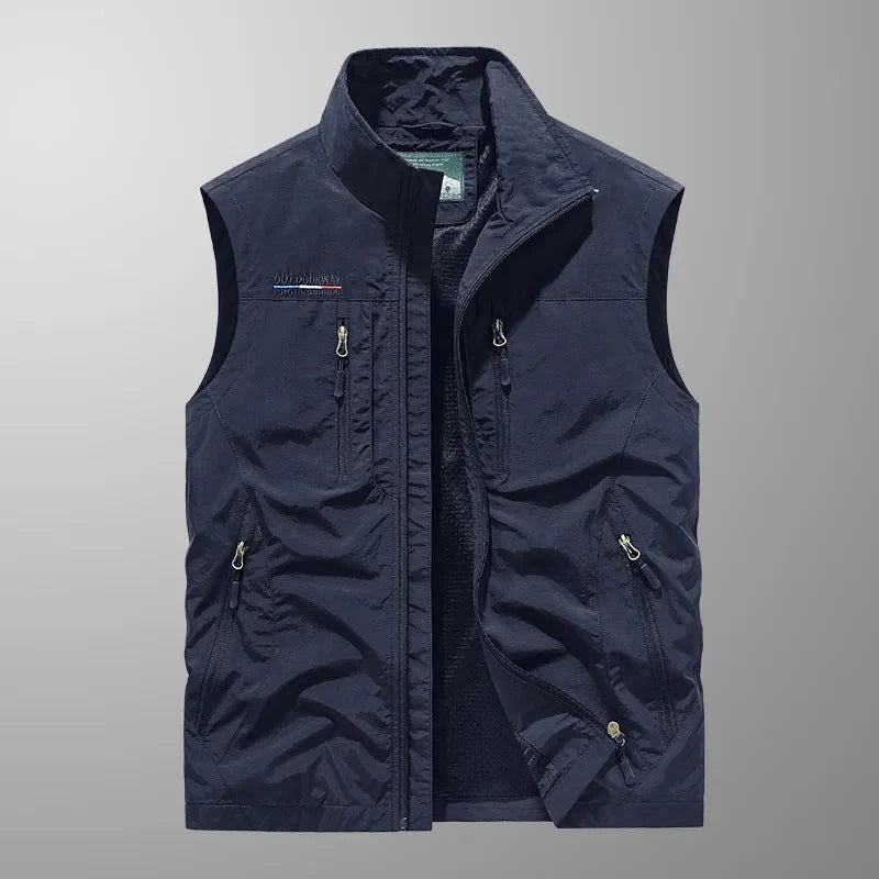 Detail shot of men's outdoor gilet zip closure and stand collar design