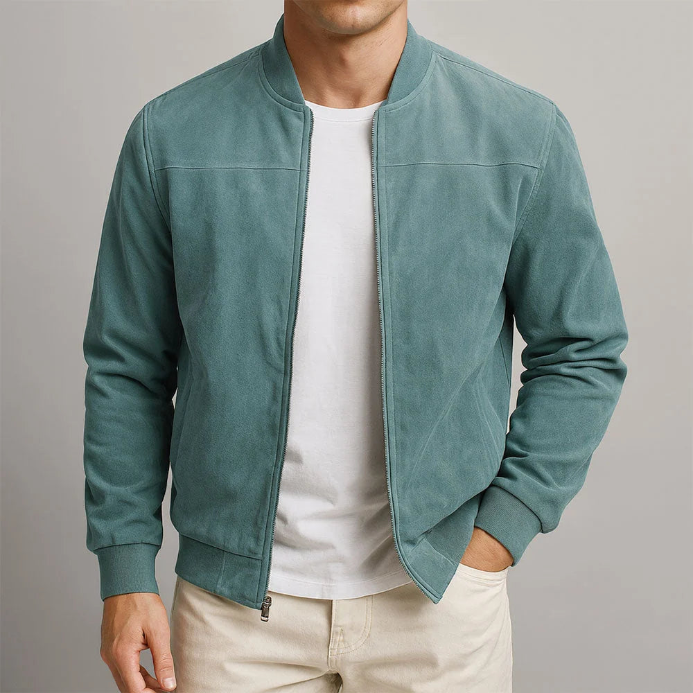 Side view of men's suede bomber jacket displaying structured shoulders and ribbed hem