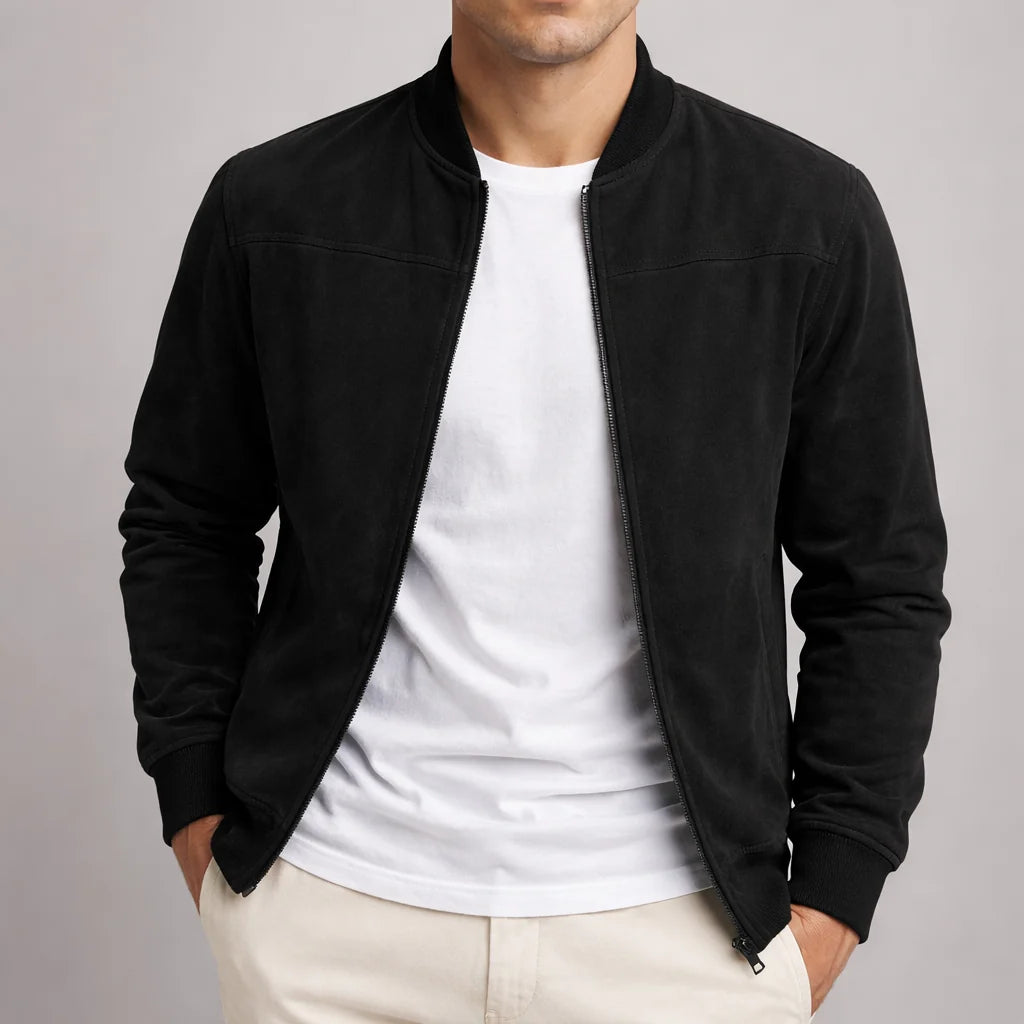 Rear view of men's suede bomber jacket showing clean silhouette and ribbed waistband