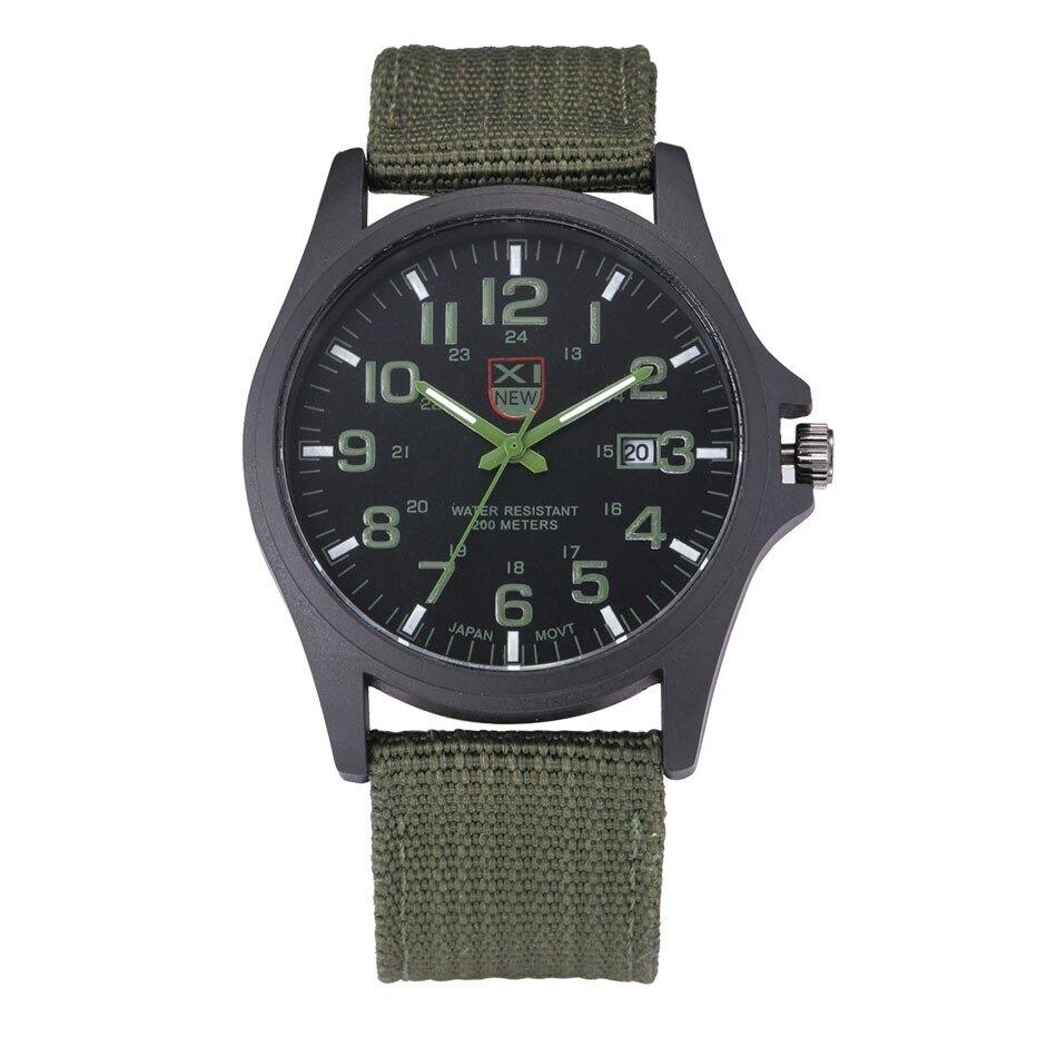 Close-up view of men's tactical watch showing date window and luminous hour markers