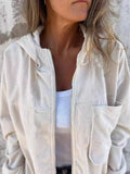 Women's corduroy hooded jacket in cream with relaxed fit and zip-up front worn over white top