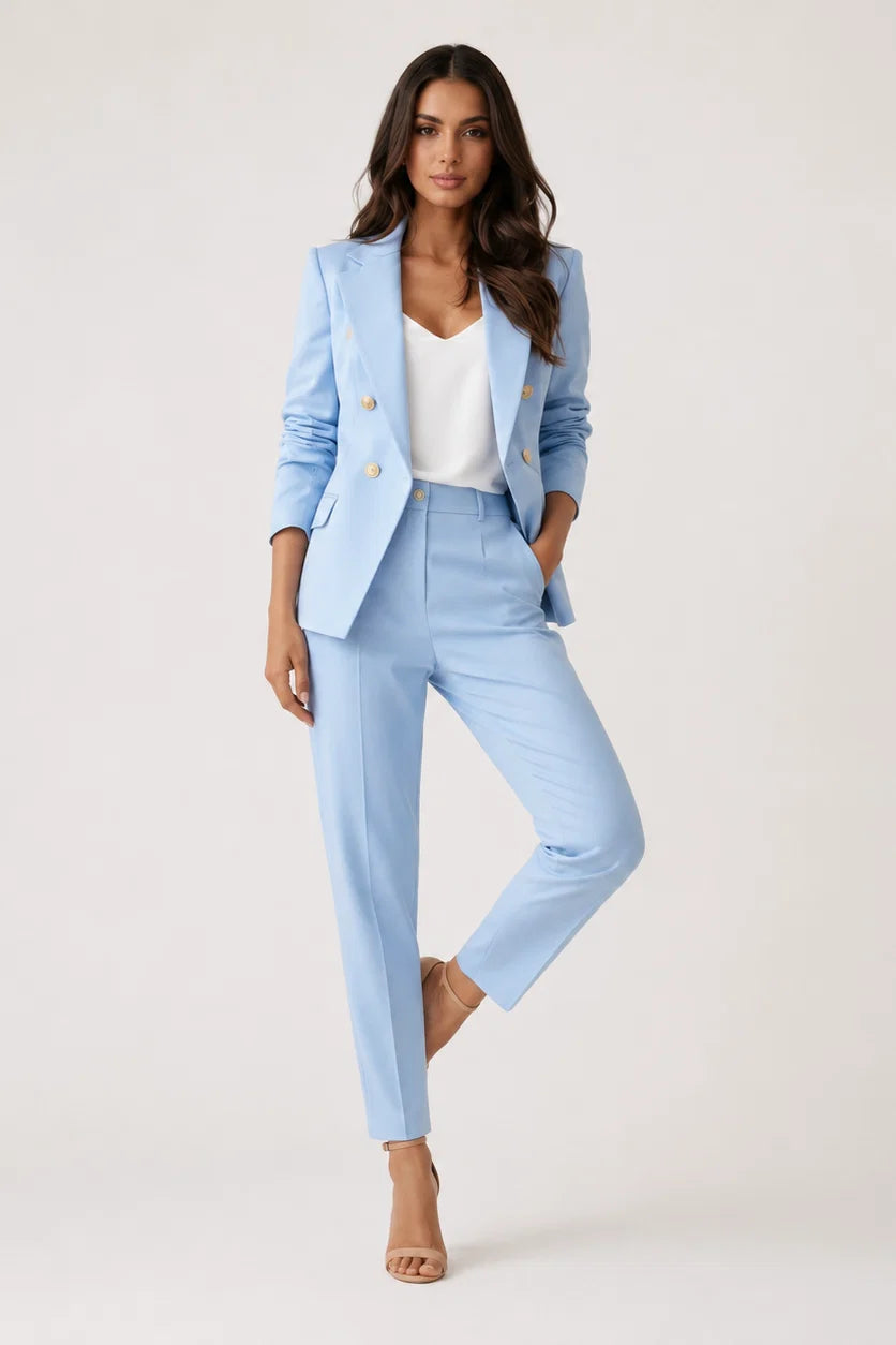 Close-up of trouser waistband and straight-leg cut with pressed centre crease