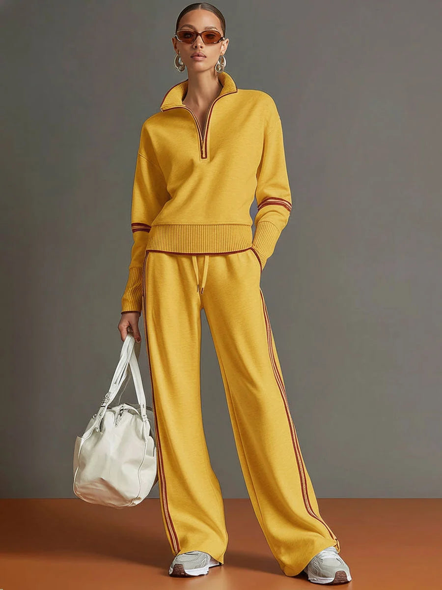 Detail of retro stripe accent running along side seam of wide leg trousers