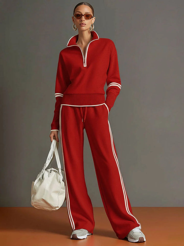 Side angle view of two-piece tracksuit set showing relaxed silhouette and stripe details
