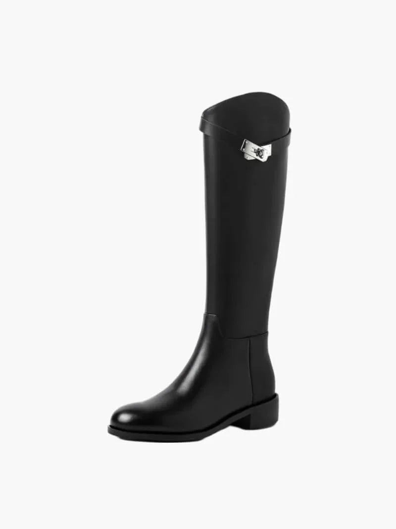 Women's knee high boots in black with structured shaft and decorative hardware detail at calf