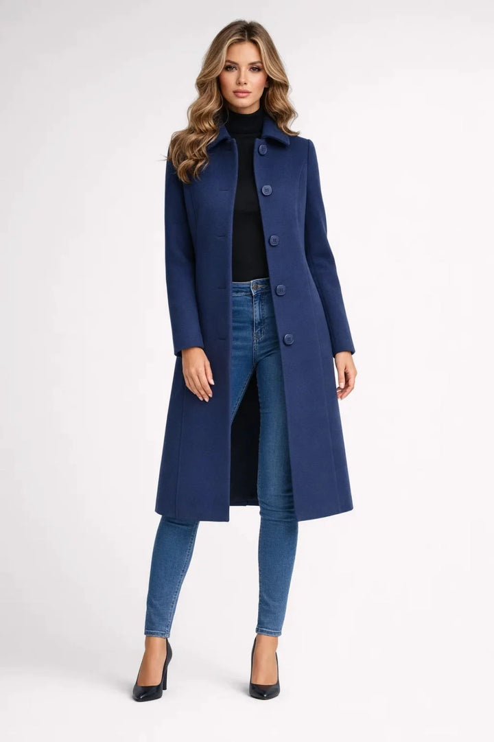 Detail of women's long coat button closure and notched collar design