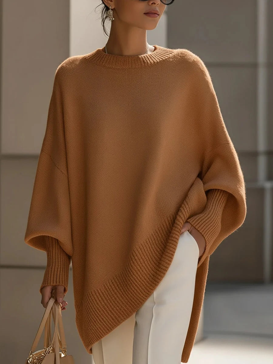Close-up of soft knit fabric texture on women's oversized jumper with ribbed detailing