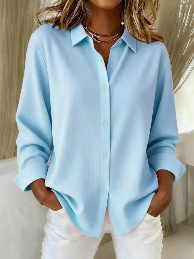 Full-length view of women's oversized shirt in relaxed fit, perfect for tucking or wearing straight out