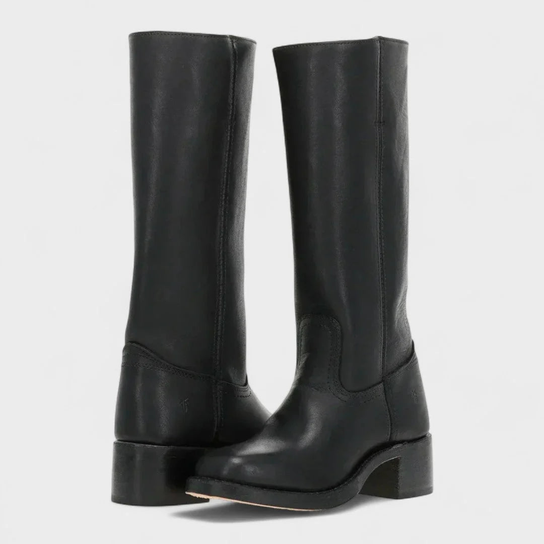 Pair of women's tall boots in dark brown showcasing side zip and classic riding boot design