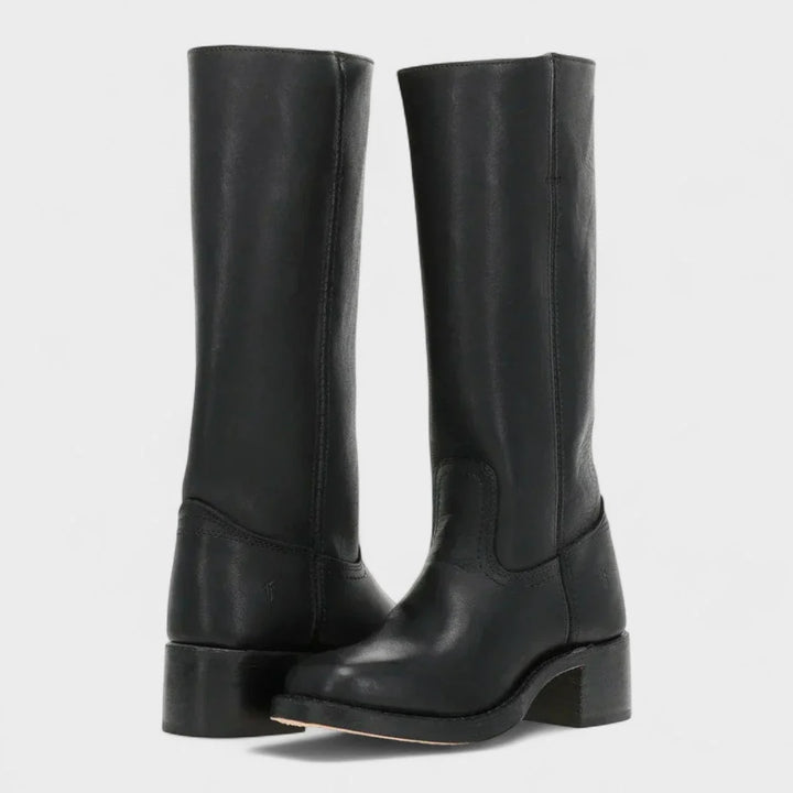 Pair of women's tall boots in dark brown showcasing side zip and classic riding boot design