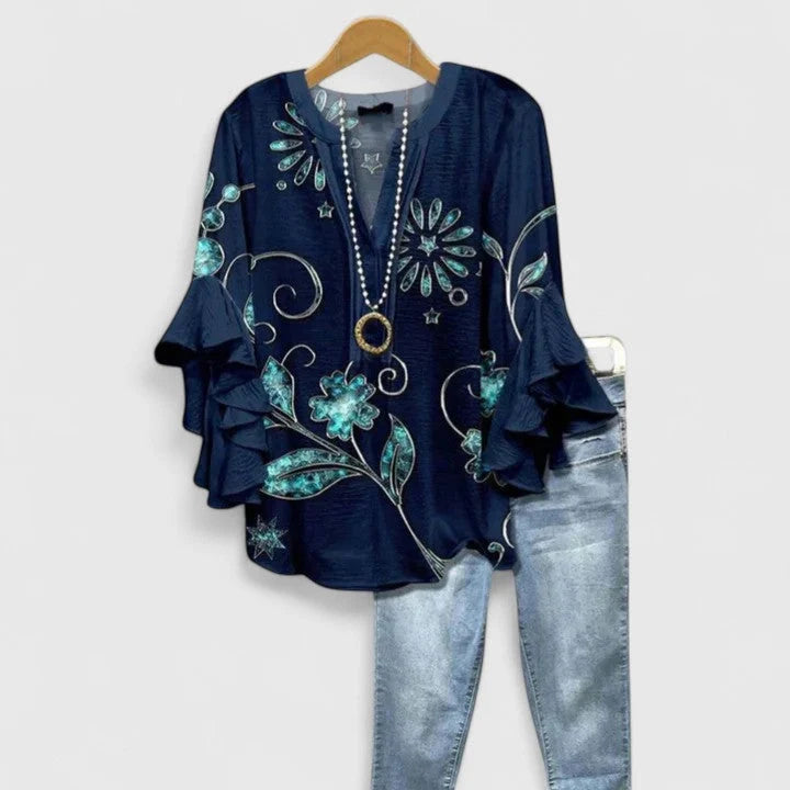 Women's floral blouse showing hip-length hem and overall silhouette