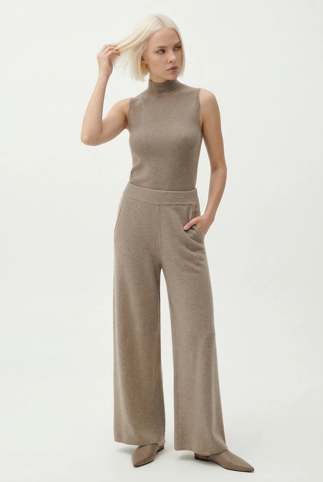 Woman wearing mohair lounge set showing coordinating two-piece design in neutral palette
