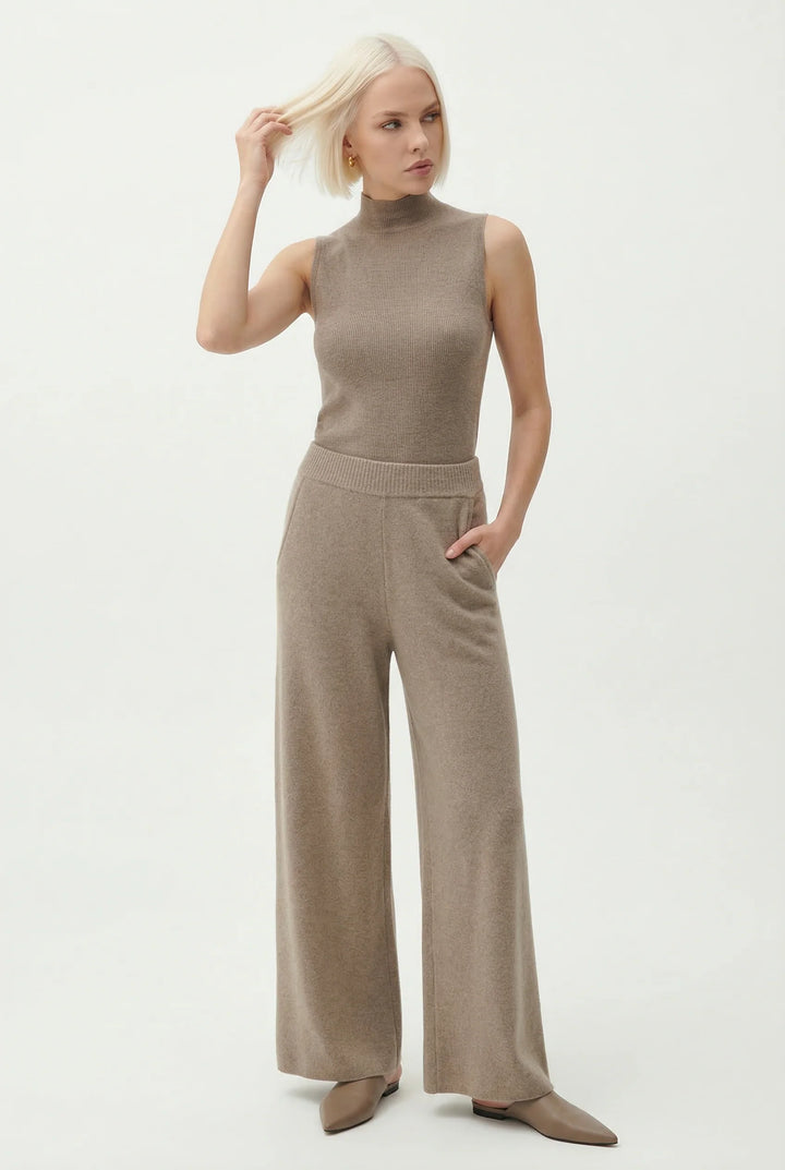 Woman wearing mohair lounge set showing coordinating two-piece design in neutral palette