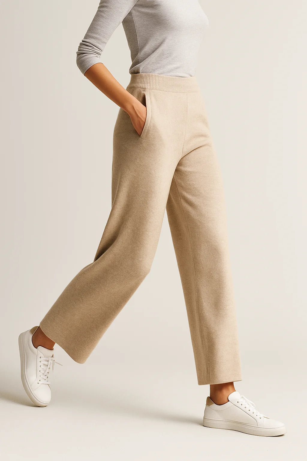 Woman in mohair lounge set highlighting coordinating knitwear pieces in neutral beige