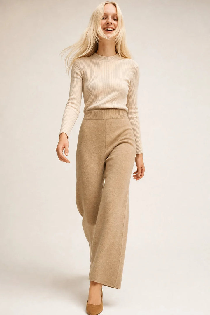 Detail of mohair lounge set turtleneck and ribbed knit texture in neutral beige tone