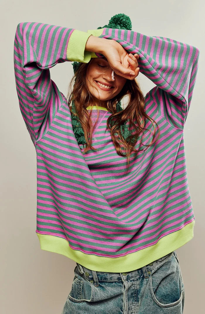 Women's oversized striped jumper with contrast neon trim at cuffs and hem, drop shoulder design