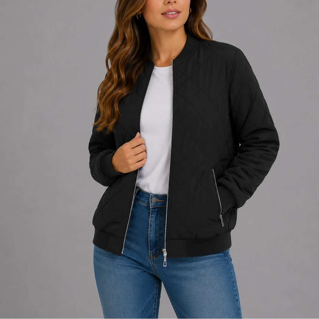 Detail shot of the ribbed cuffs and hem on the women's quilted bomber jacket