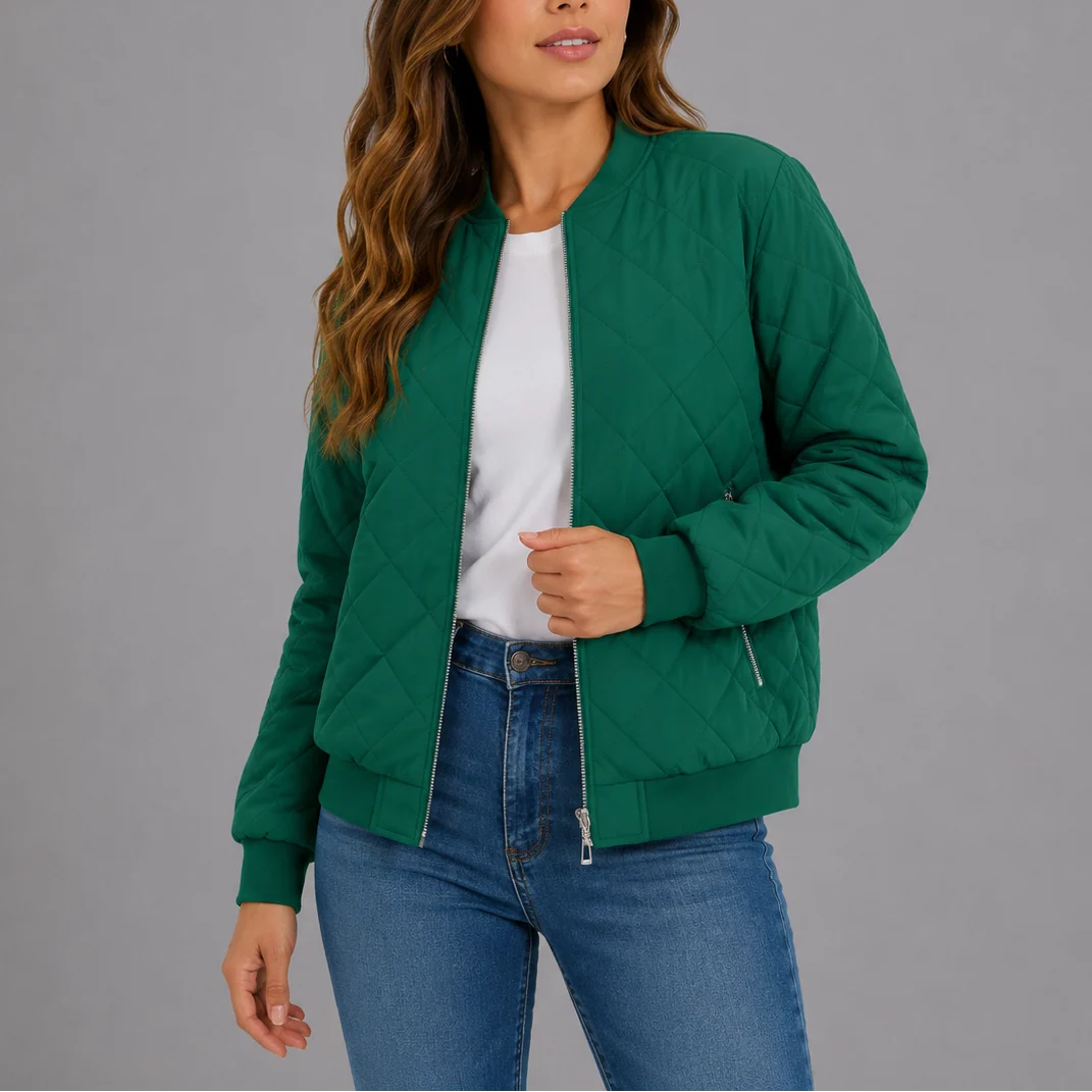 Detail of the side slip pockets and structured quilted fabric on the bomber jacket