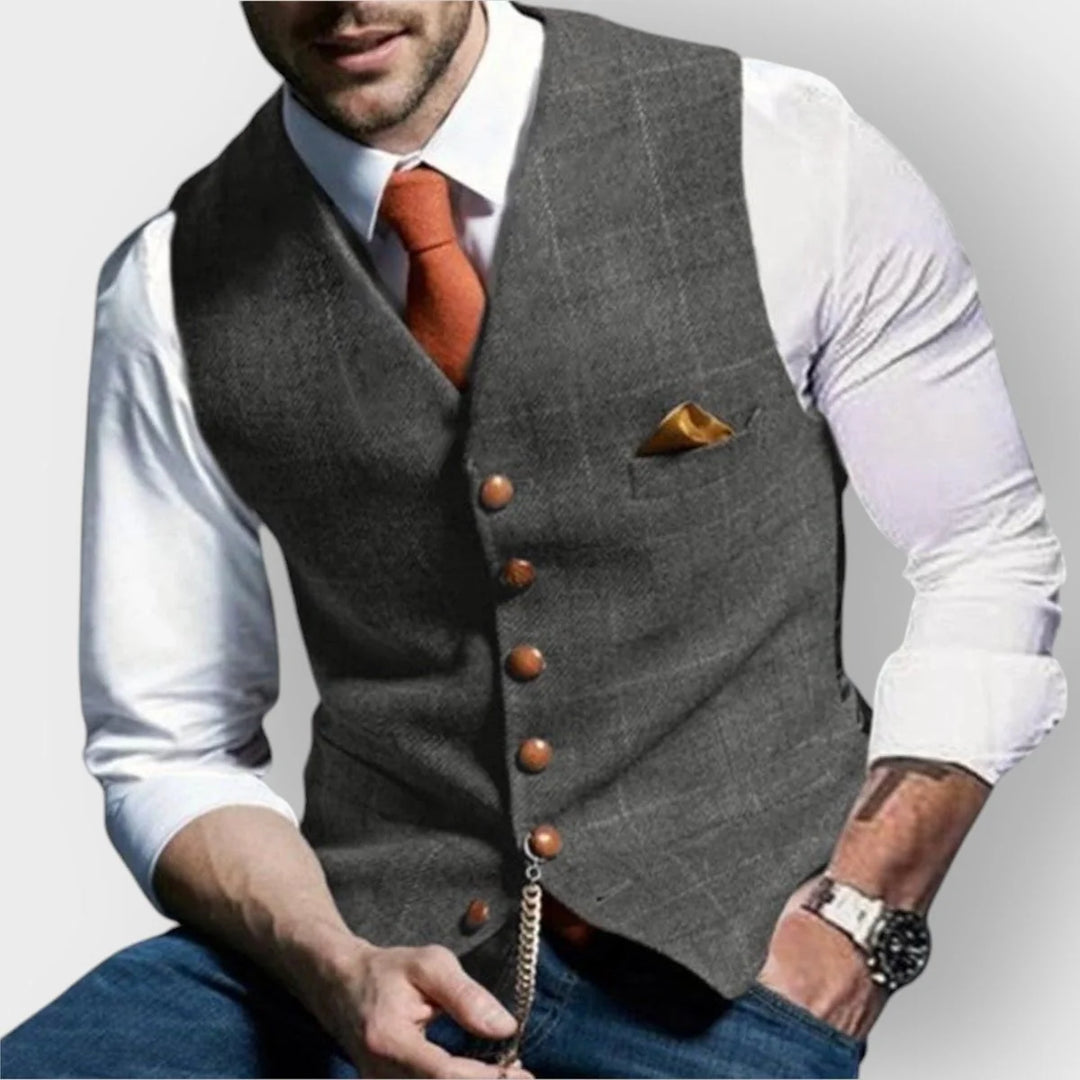 Side view of men's slim-fit tweed waistcoat layered over shirt for wedding attire
