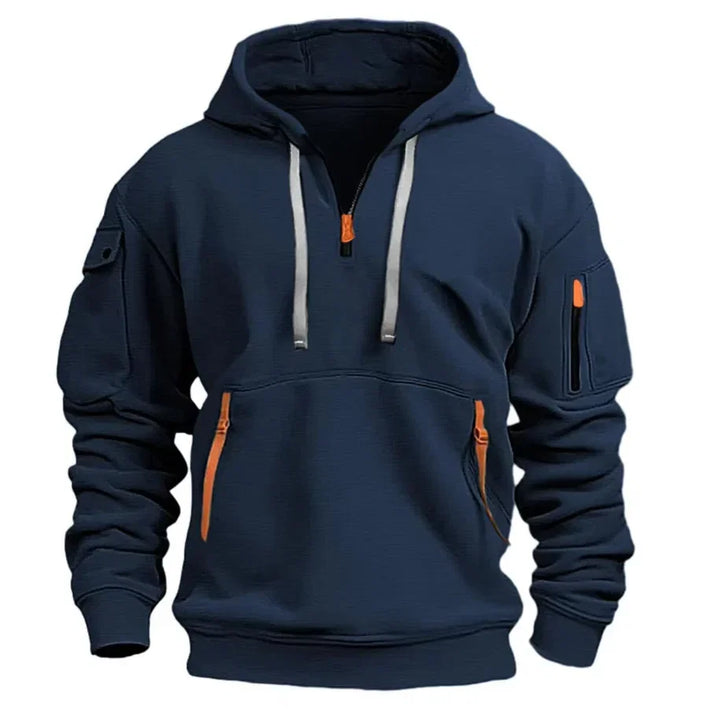 Men's navy pullover hoodie with half-zip closure, orange contrast zips, and adjustable drawstring hood