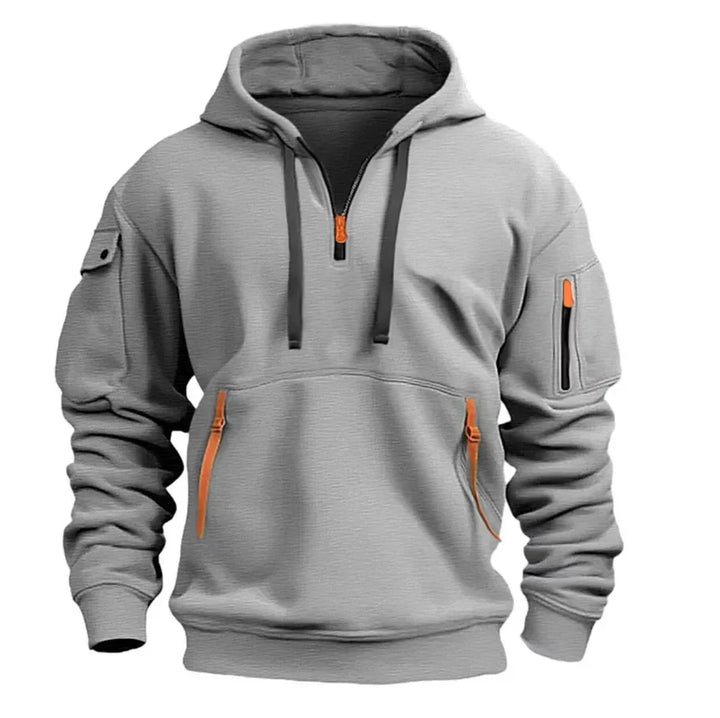 Front view of men's zip pocket hoodie showing dual diagonal pockets and orange zip detailing