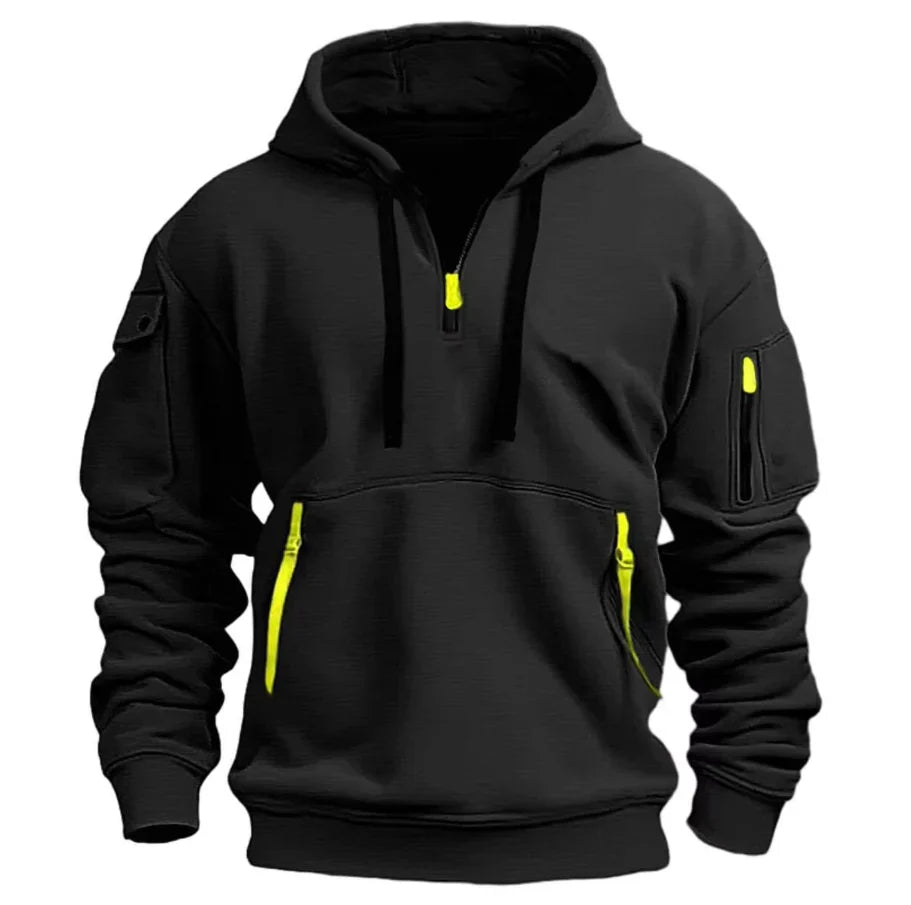 Side angle of pullover hoodie displaying sleeve zip pocket and relaxed fit silhouette