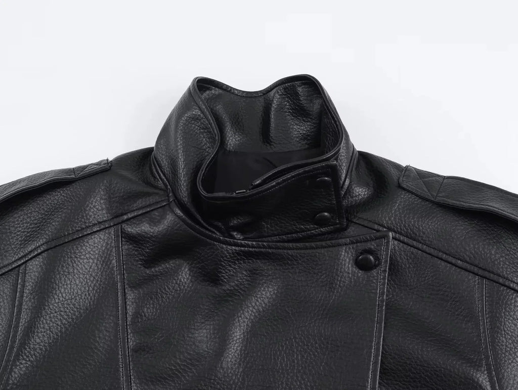 Full view of women's black bomber jacket with structured silhouette and smooth finish