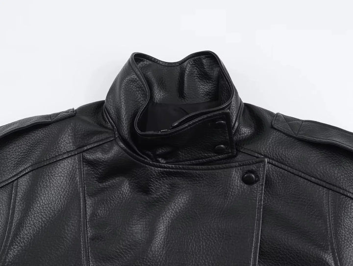 Full view of women's black bomber jacket with structured silhouette and smooth finish